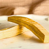 Wooden block on a marble surface with a blurred background
