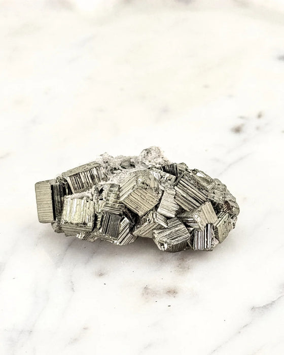 Small Pyrite Crystal Cluster – Abundance & Manifestation